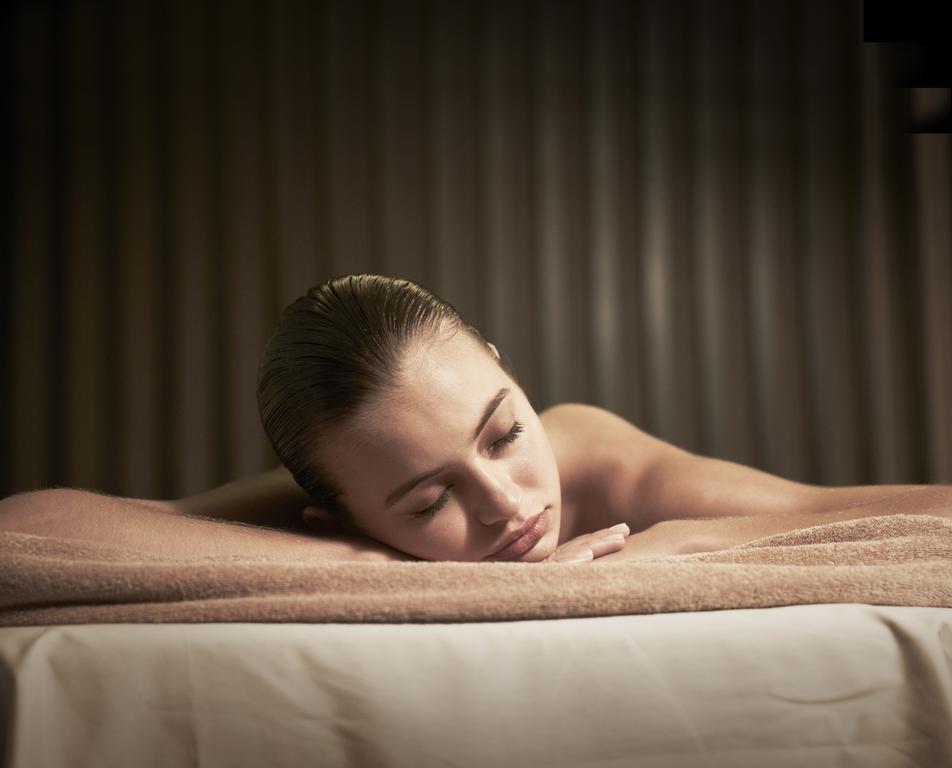 The Darling At The Star Hotel Sydney Kültér fotó A woman relaxing on a massage table